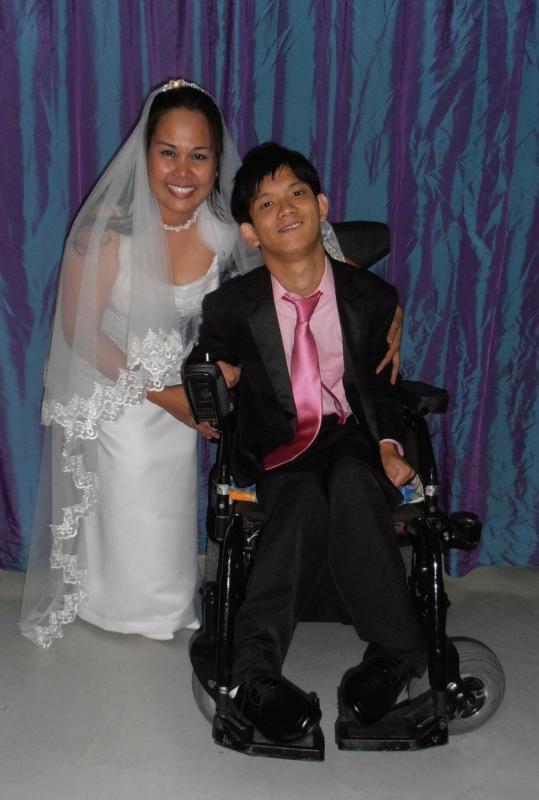 黄忠龙与罗丽娜结婚是他人生的一大转折。(黄忠龙提供)