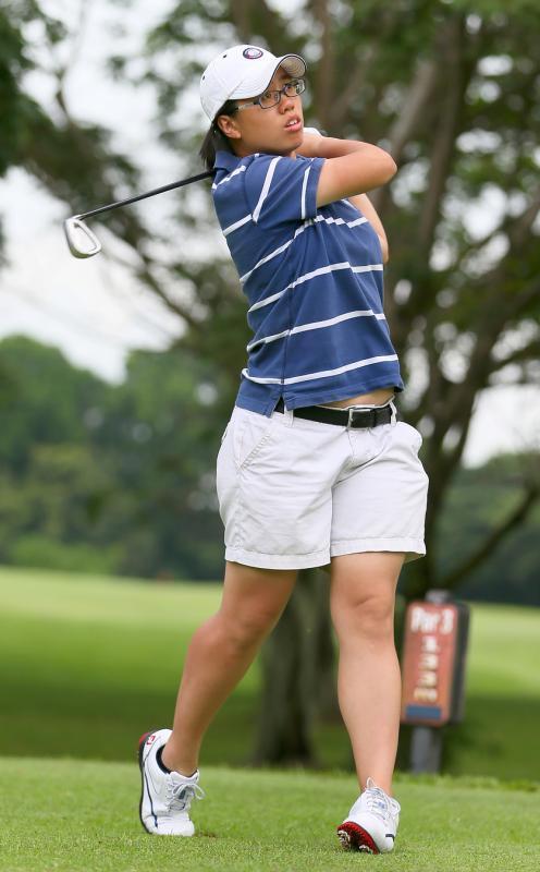 洪羚嘉曾是我国女子高尔夫球国家队代表,她喜欢高球运动开阔与安静的环境。高球也让她与飞行结缘。(档案照)