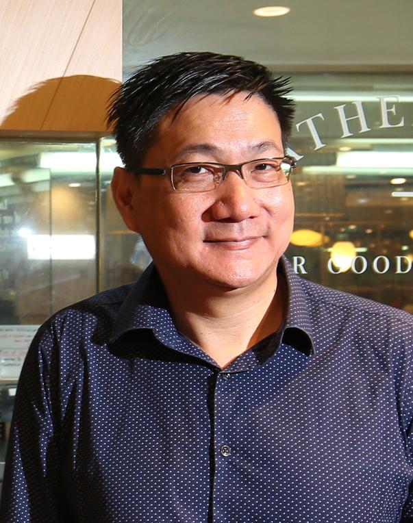 张耀文和其团队研发出全球首台全自动化煮鸡只机器。