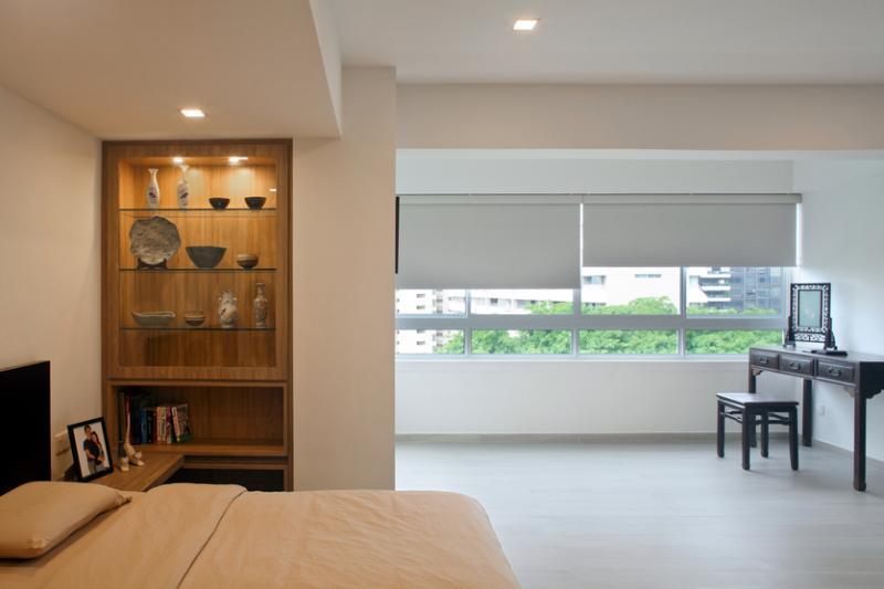 古玩和古董家具为主卧添雅致。