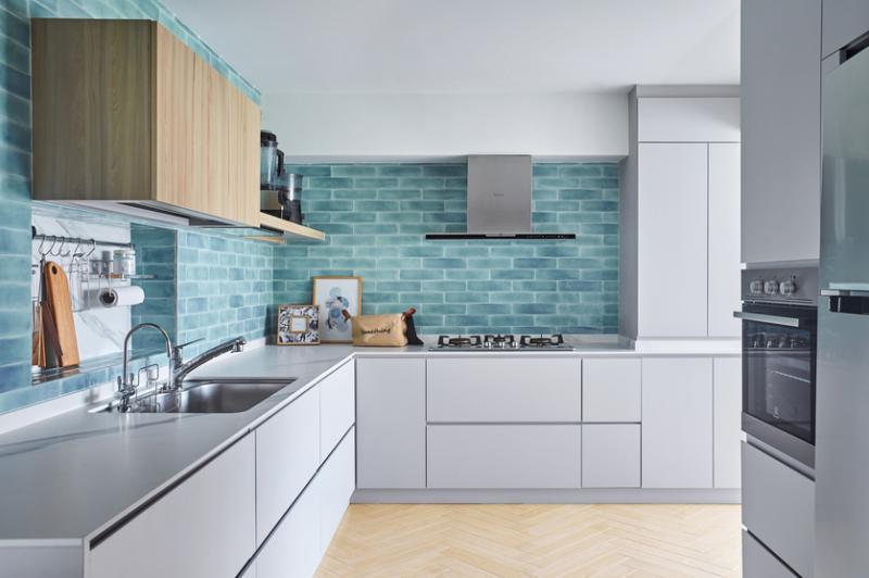 偌大的厨房满足了女屋主喜欢下厨的需要。