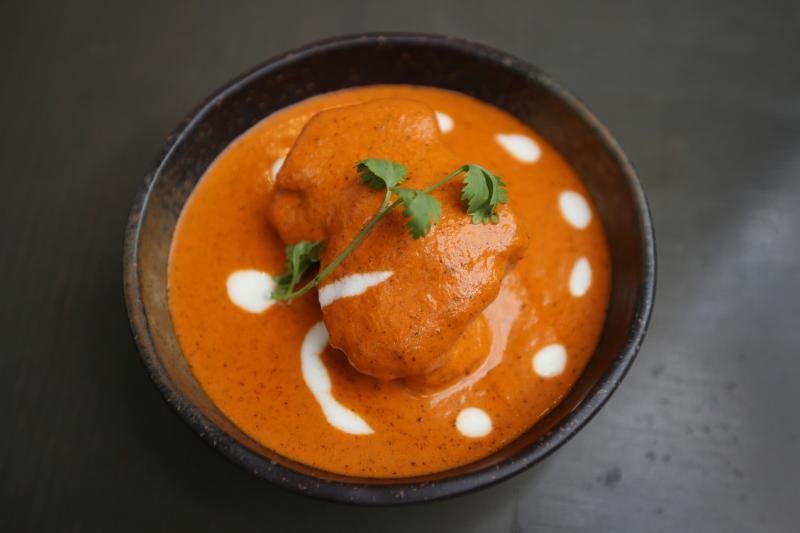 Punjab Grill的招牌牛油鸡。（梁伟康摄影）