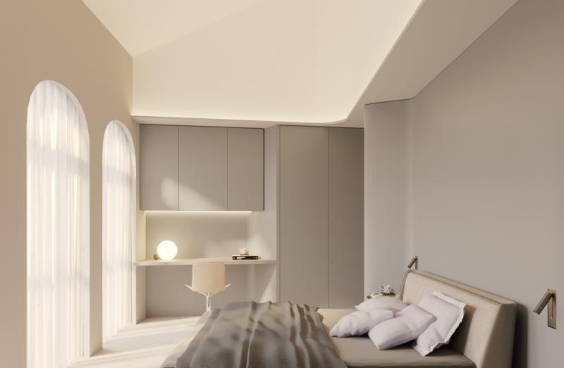 弧线弯进主卧室，在入口处伸出数十公分，才拗回床头，融入墙壁，突出的部分仿佛是个小湾，为男女主人制造多一些私密感。