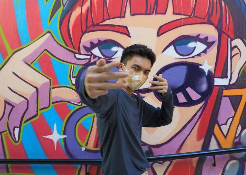 黄明凯创办Elevate the Streets青年团体，与一群志同道合的街舞义工，为边缘少年付出心力，指引他们从歧途“跳”回正轨。（林国明摄）