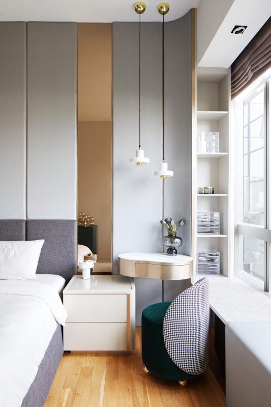 主卧小角落处,悬挂式的腰豆形梳妆台是充分利用空间的巧思。