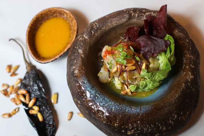 秘鲁腌鱼少不了黄辣椒。(李健玮摄)