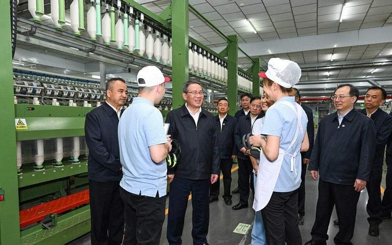 Li stressed that he was studying Xinjiang and inspecting textile companies sanctioned by the United States | Lianhe Zaobao