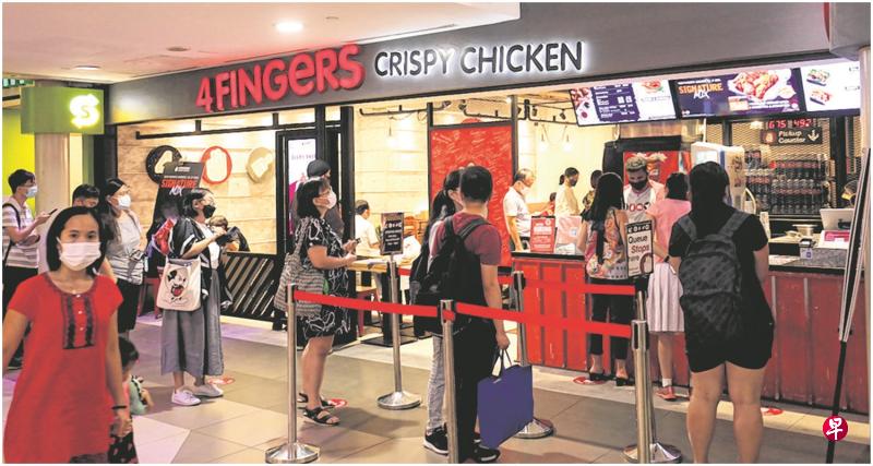 确诊病患曾于4月15日到访碧山第八站(Junction 8)的快餐店Four Fingers。(邝启聪摄) 确诊病患曾于4月15日到访碧山第八站(Junction 8)的快餐店Four Fingers。(邝启聪摄)