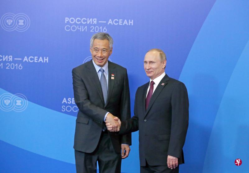 李显龙总理(左)有意在两年内谈妥新加坡—欧亚经济联盟自贸协定,俄罗斯总统普京表示支持。(海峡时报) 李显龙总理(左)有意在两年内谈妥新加坡—欧亚经济联盟自贸协定,俄罗斯总统普京表示支持。(海峡时报)