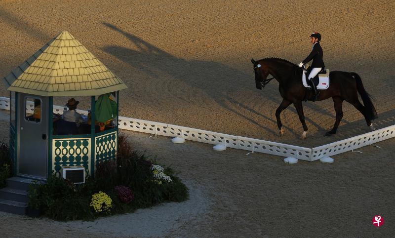 陈雁仪和爱驹在比赛中配合无间。(路透社) 陈雁仪和爱驹在比赛中配合无间。(路透社)