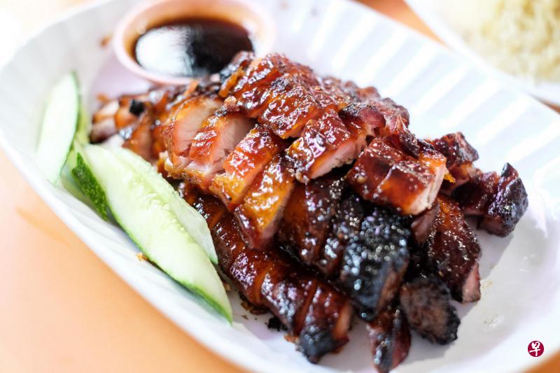 “烧味天堂”坚持使用炭火来烤叉烧,叉烧肥瘦参杂,入口即化 。 “烧味天堂”坚持使用炭火来烤叉烧,叉烧肥瘦参杂,入口即化 。