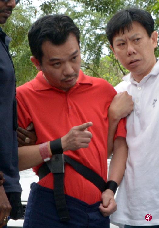 绑架“昇菘嫲”的被告李士荣(红衣)今天被判罪成。(档案照片) 绑架“昇菘嫲”的被告李士荣(红衣)今天被判罪成。(档案照片)