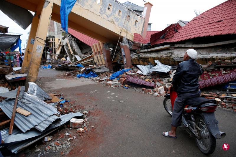 受灾最严重的皮迪贾亚镇灾后面貌令人触目惊心。(路透社) 受灾最严重的皮迪贾亚镇灾后面貌令人触目惊心。(路透社)