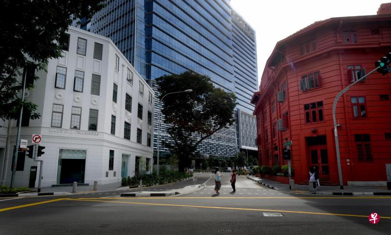 麦士威国际争议解决中心（白色建筑）将扩充，隔邻的红点交通大厦在2019年将成为中心的一部分，两座大厦之间会由一座天桥衔接。（曾坤顺摄）