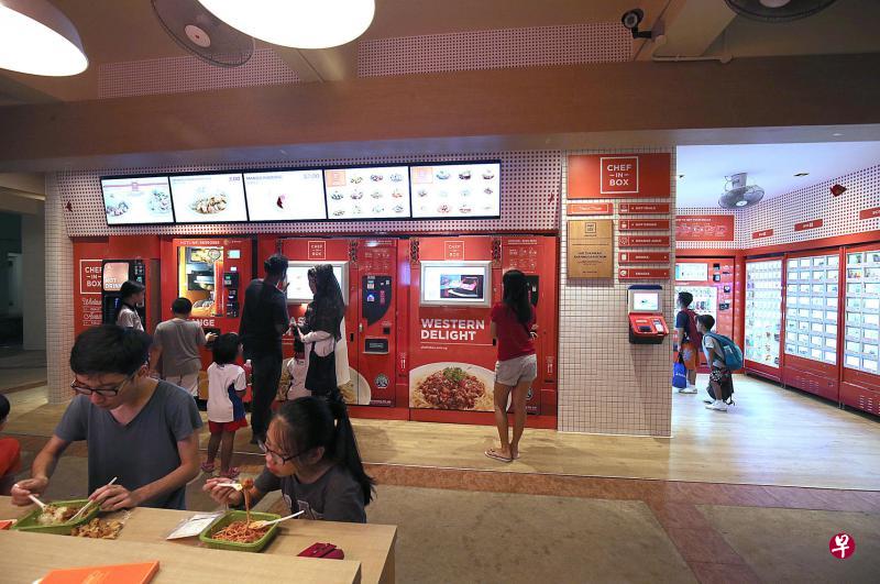 从选择餐饮、付款、领取食物到进餐，VendCafe为消费者提供全自助餐饮体验。（邬福梁摄）