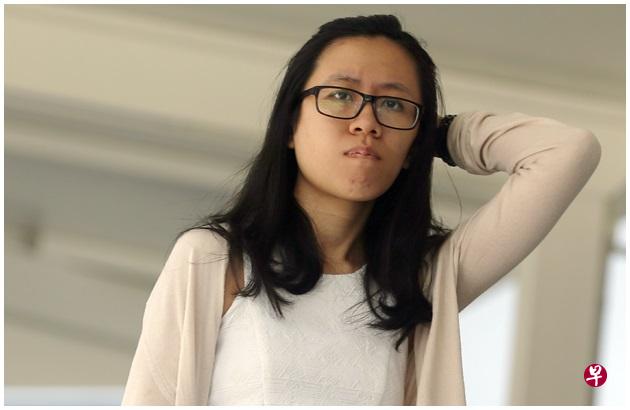 被告王丽英面对侮辱女性尊严的罪状,今早被判入狱30周。(海峡时报) 被告王丽英面对侮辱女性尊严的罪状,今早被判入狱30周。(海峡时报)