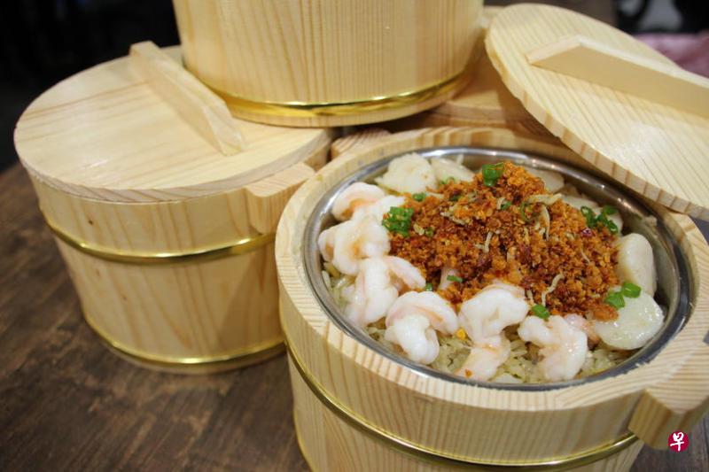 曾在大巴窑风靡一时的金桶饭,如今在兀兰“重出江湖”。(商家提供) 曾在大巴窑风靡一时的金桶饭,如今在兀兰“重出江湖”。(商家提供)