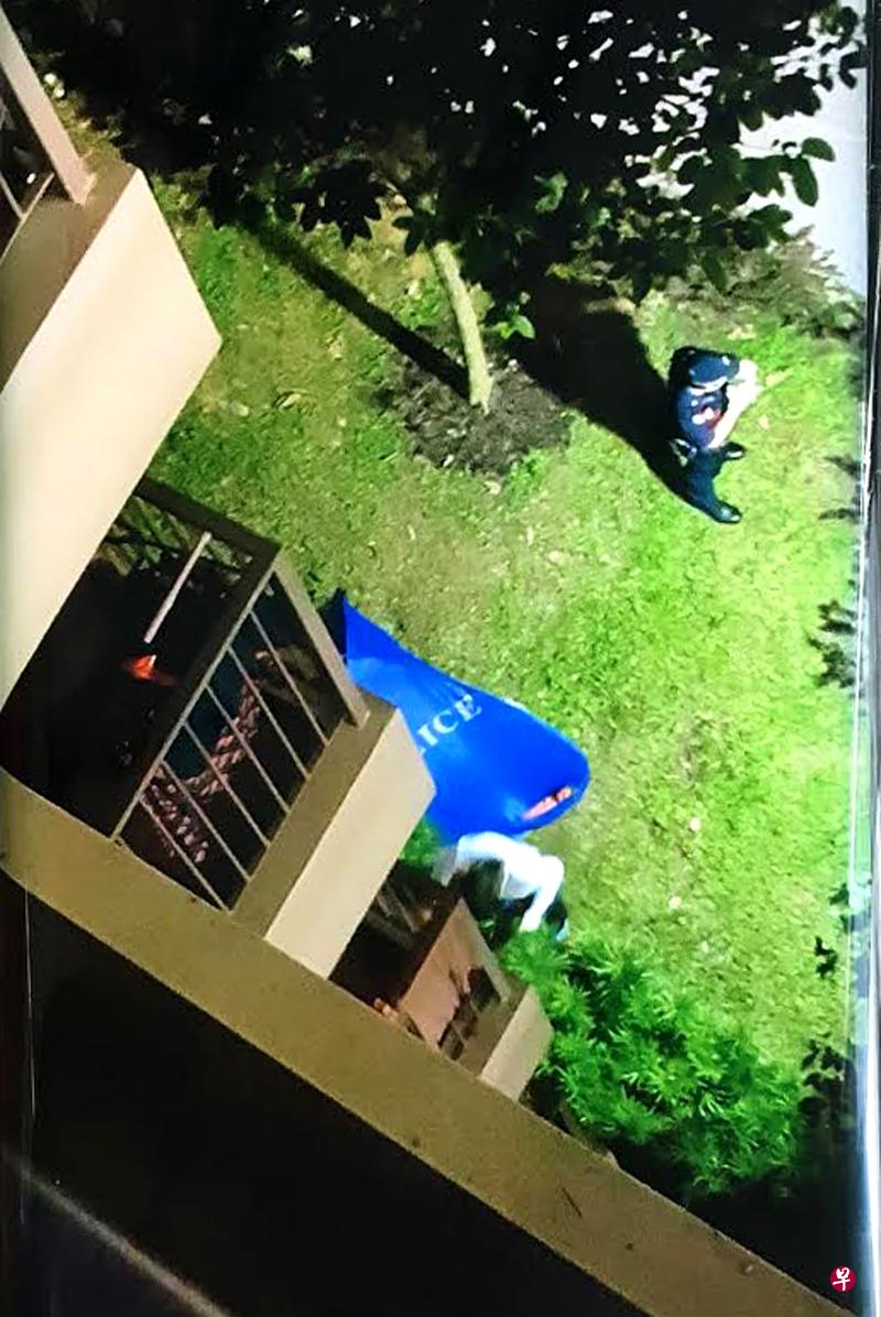 男死者卧倒在组屋底层的草坪上。(受访者提供) 男死者卧倒在组屋底层的草坪上。(受访者提供)