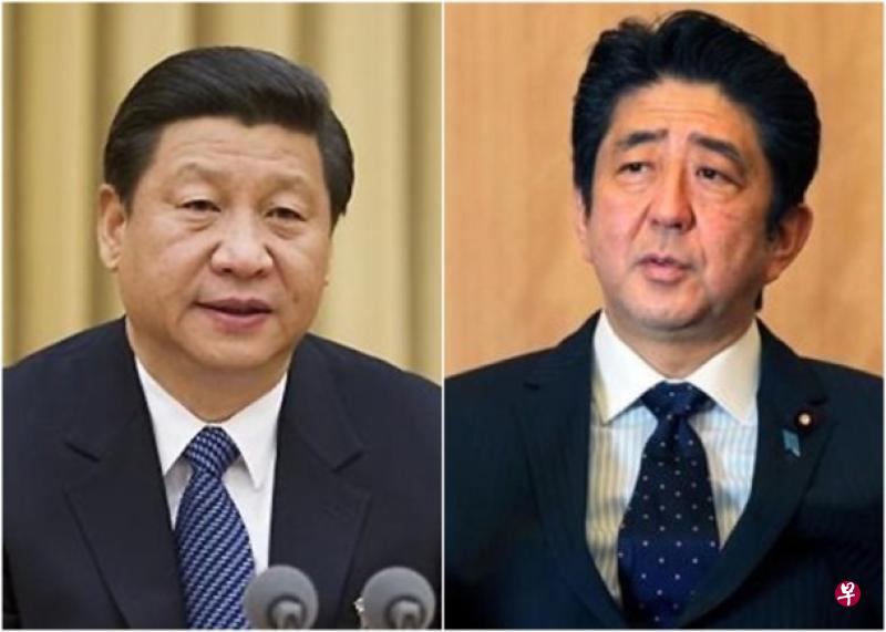 中国国家主席习近平(左)和日本首相安倍晋三。(档案照片) 中国国家主席习近平(左)和日本首相安倍晋三。(档案照片)