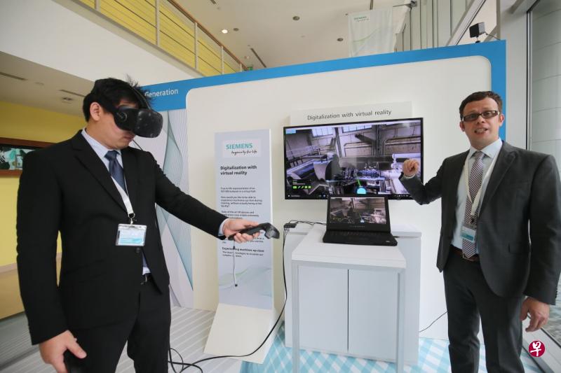 西门子展示数码化中心研发的其中一项方案。 西门子展示数码化中心研发的其中一项方案。