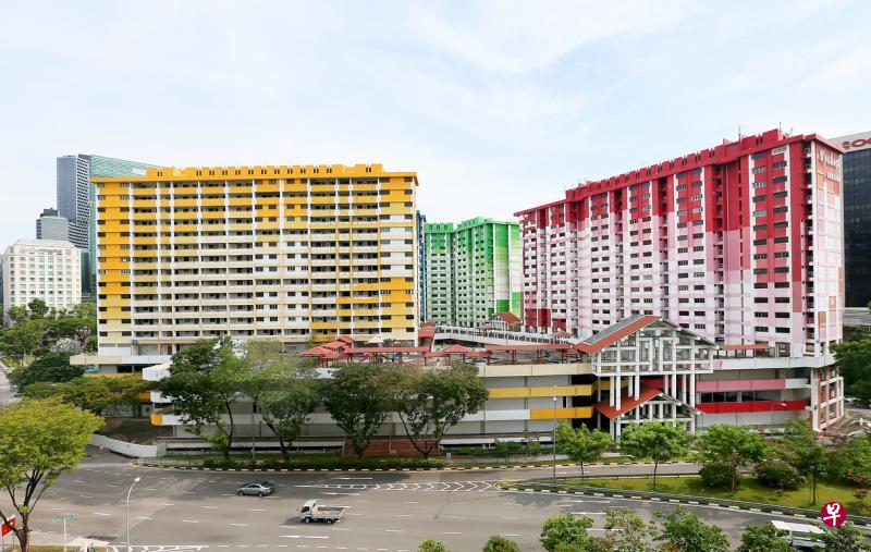 将在明年初拆除的梧槽坊四座组屋是市区中一道美丽的风景线。(海峡时报) 将在明年初拆除的梧槽坊四座组屋是市区中一道美丽的风景线。(海峡时报)