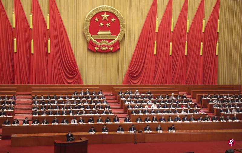 3月13日,第十三届全国人大一次会议在北京人民大会堂举行会议,商讨国务院机构改革方案。(中新社) 3月13日,第十三届全国人大一次会议在北京人民大会堂举行会议,商讨国务院机构改革方案。(中新社)