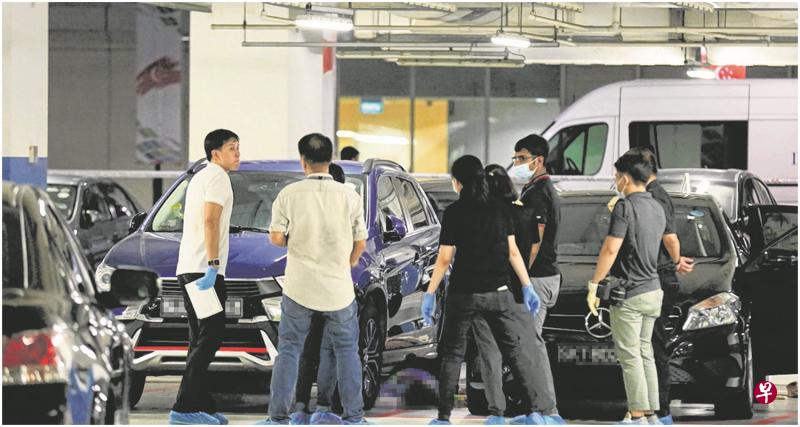 谋杀案发生后,大批警员曾在宏茂桥工艺教育中区学院A楼的停车场展开调查工作。(档案照) 谋杀案发生后,大批警员曾在宏茂桥工艺教育中区学院A楼的停车场展开调查工作。(档案照)