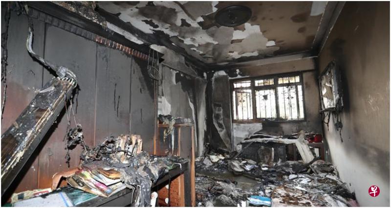 失火房间瞬间被烧得面目全非,只剩下床架及一地的灰烬。(饶进礼摄) 失火房间瞬间被烧得面目全非,只剩下床架及一地的灰烬。(饶进礼摄)