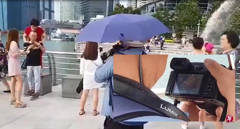 男子被拍,拍完照后查看画面。(读者提供) 男子被拍,拍完照后查看画面。(读者提供)