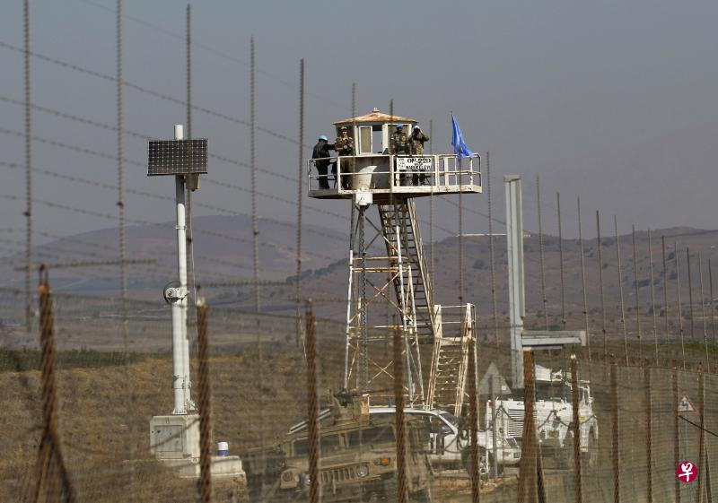 联合国部队在戈兰高地的观察哨站岗,严密防守。(法新社) 联合国部队在戈兰高地的观察哨站岗,严密防守。(法新社)