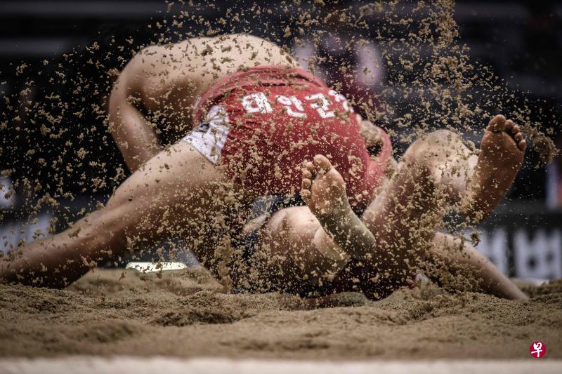 韩朝分别申请的民俗摔跤共同列入人类非物质文化遗产代表作名录。(法新社) 韩朝分别申请的民俗摔跤共同列入人类非物质文化遗产代表作名录。(法新社)