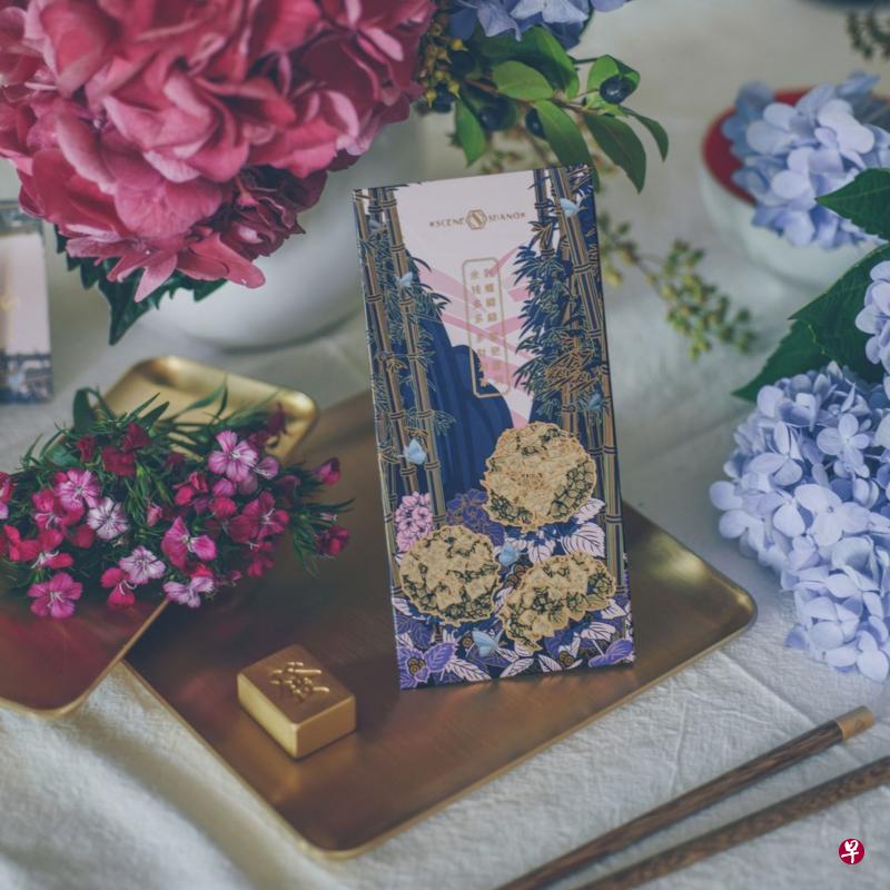 新赏推出深蓝配粉红的主色系红包封,在一片红海中别致出众。(受访者与商家提供) 新赏推出深蓝配粉红的主色系红包封,在一片红海中别致出众。(受访者与商家提供)