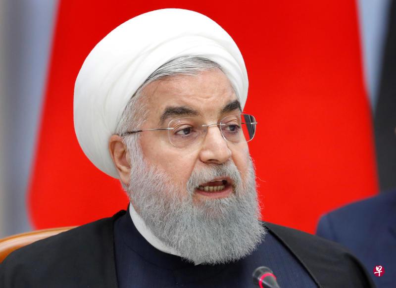 鲁哈尼周一起访问伊拉克。(路透社) 鲁哈尼周一起访问伊拉克。(路透社)