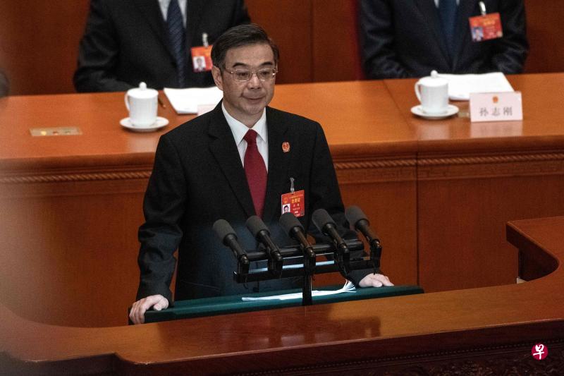 中国最高人民法院院长周强昨天向全国人大做报告。(法新社) 中国最高人民法院院长周强昨天向全国人大做报告。(法新社)
