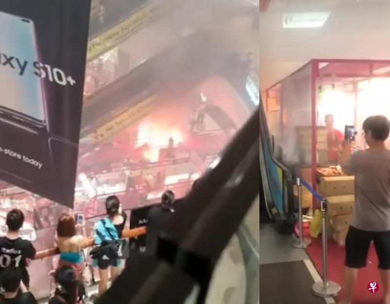 淡滨尼广场日本美食展的其中一个摊位突然失火,不少公众丝毫没有离开的打算,反倒是掏出手机猛拍。(互联网) 淡滨尼广场日本美食展的其中一个摊位突然失火,不少公众丝毫没有离开的打算,反倒是掏出手机猛拍。(互联网)