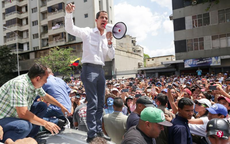 委内瑞拉上周二爆发历来规模最大的街头示威。(法新社) 委内瑞拉上周二爆发历来规模最大的街头示威。(法新社)