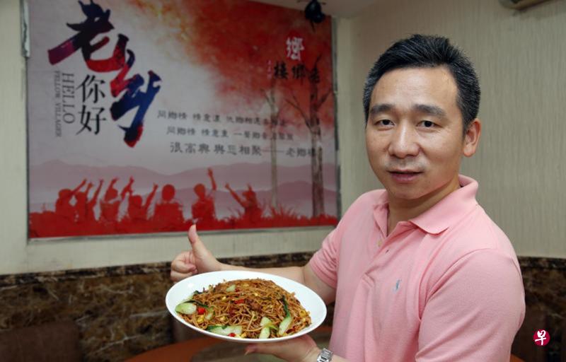 钟少平经营的老乡楼售卖正宗江西菜。 钟少平经营的老乡楼售卖正宗江西菜。
