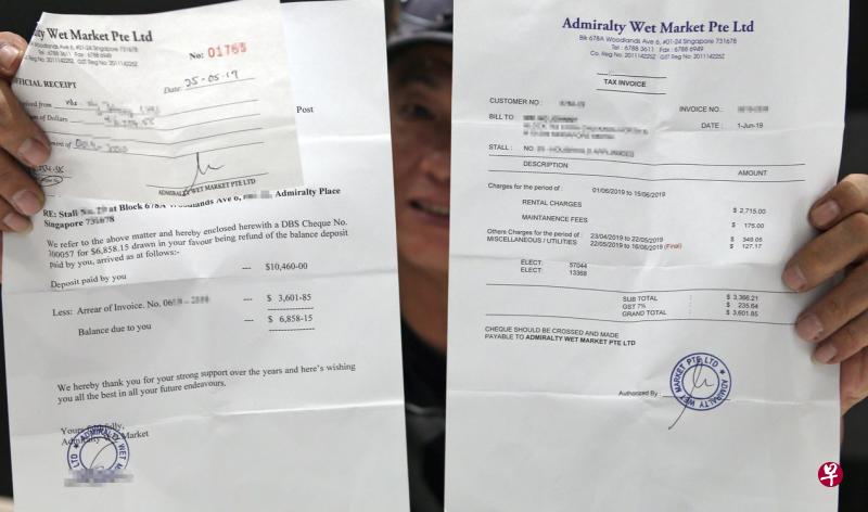 海军部巴刹的摊贩向记者出示单据,指巴刹老板从押金扣除租金。(陈渊庄摄) 海军部巴刹的摊贩向记者出示单据,指巴刹老板从押金扣除租金。(陈渊庄摄)