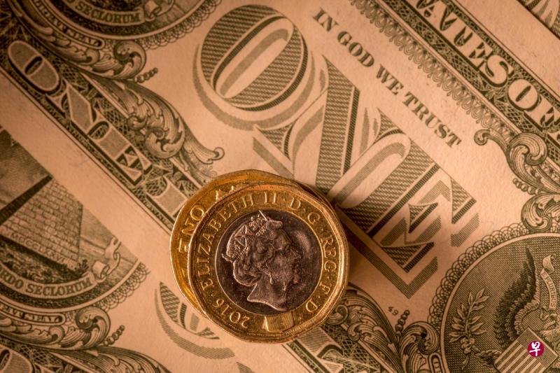 英镑兑美元星期二跌0.5%至1.2122,是两年多来的最低水平。(彭博社) 英镑兑美元星期二跌0.5%至1.2122,是两年多来的最低水平。(彭博社)