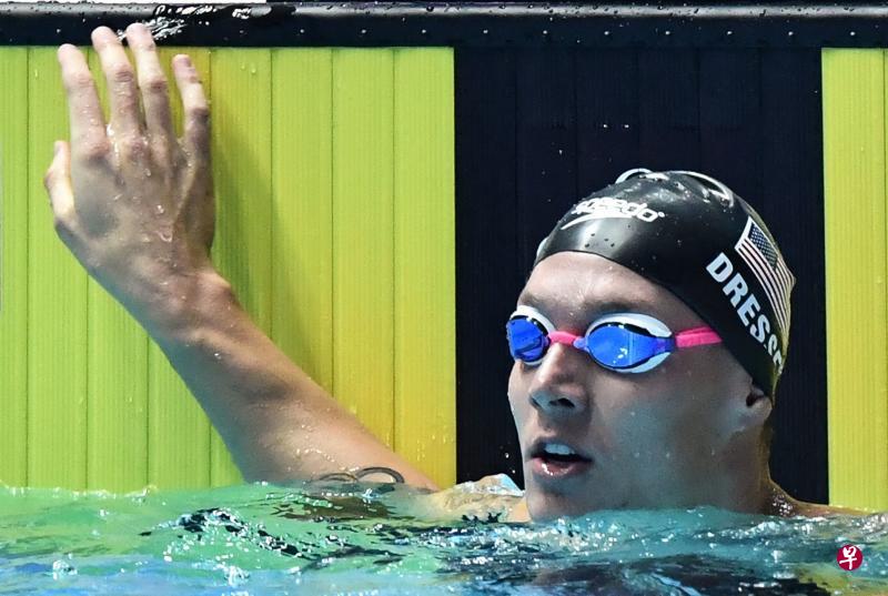 世锦赛豪取8枚奖牌创下历史的美国名将德雷塞尔在男子100米蝶泳决赛率先触壁夺冠。(法新社) 世锦赛豪取8枚奖牌创下历史的美国名将德雷塞尔在男子100米蝶泳决赛率先触壁夺冠。(法新社)