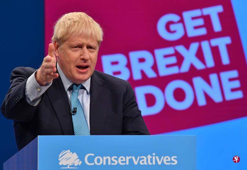 约翰逊周三在保守党大会上表明,英国已就脱欧协议作出妥协,希望欧盟也能退一步。(法新社) 约翰逊周三在保守党大会上表明,英国已就脱欧协议作出妥协,希望欧盟也能退一步。(法新社)
