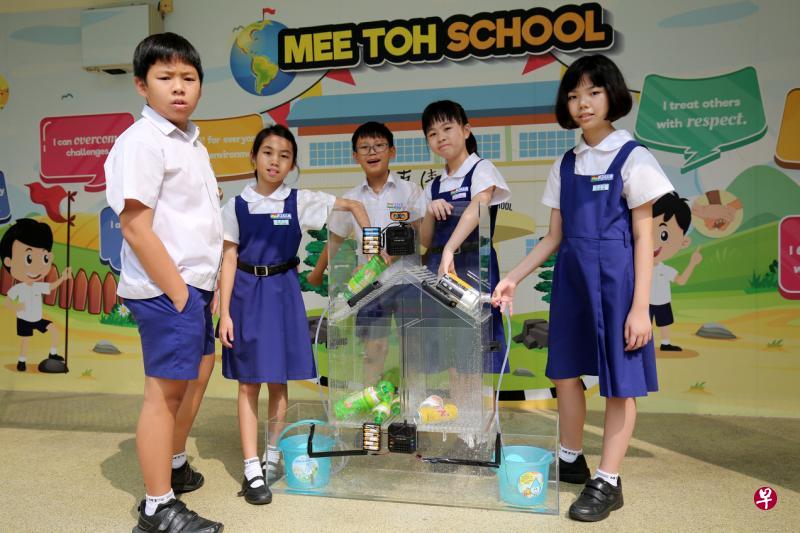 弥陀学校学生设计出一款可分类、清洗并回收用水的特制机器。(梁麒麟摄) 弥陀学校学生设计出一款可分类、清洗并回收用水的特制机器。(梁麒麟摄)