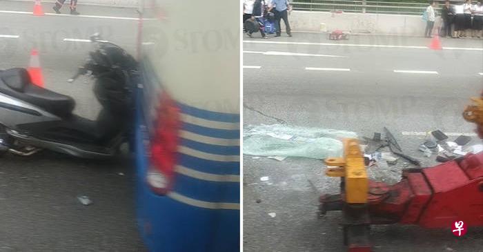 武吉知马高速公路发生车祸,摩托车撞上巴士后方,巴士前方地上散落不少碎片。(Stomp网站截图) 武吉知马高速公路发生车祸,摩托车撞上巴士后方,巴士前方地上散落不少碎片。(Stomp网站截图)