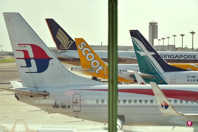 新加坡航空公司与马来西亚航空集团日前签署合作协议，以业务分成方式经营往返新马两地的航线，扩大联号服务航线，以及联合营销促进两地的旅游业。（档案照片）