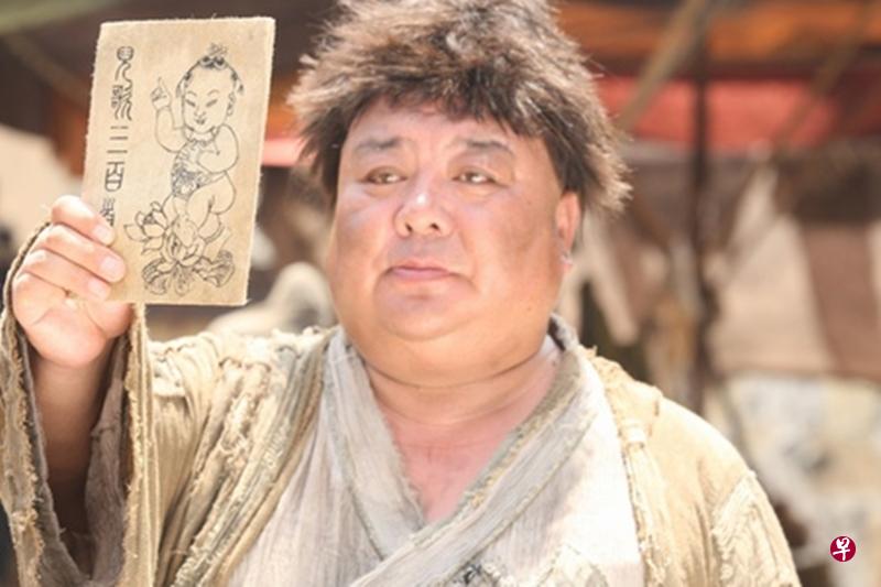 程思寒在《西游·降魔篇》饰演玄奘的师傅,并将“儿歌三百首”传授给他。(互联网) 程思寒在《西游·降魔篇》饰演玄奘的师傅,并将“儿歌三百首”传授给他。(互联网)