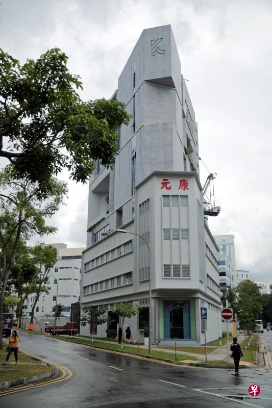 康元饼干厂保留旧建筑,后面加建新楼。(档案照片) 康元饼干厂保留旧建筑,后面加建新楼。(档案照片)