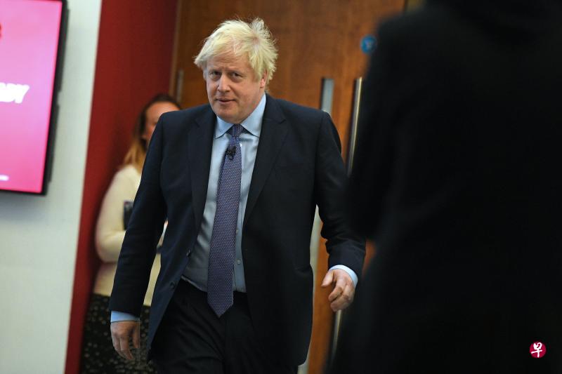 最新民调分析显示,在12月12日举行的英国大选中,英国首相约翰逊领导的保守党有望取得过半优势。(法新社) 最新民调分析显示,在12月12日举行的英国大选中,英国首相约翰逊领导的保守党有望取得过半优势。(法新社)
