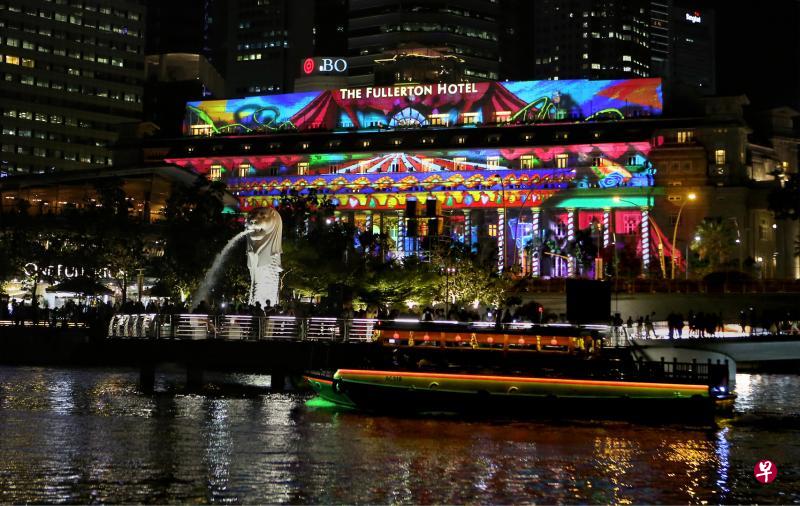 透过下一代人的视角来看这世界的将来。由彼岸社会服务和SHINE青少儿童服务小朋友创作的图画,投射在富丽敦酒店外墙,为滨海湾增添色彩。(严宣融摄) 透过下一代人的视角来看这世界的将来。由彼岸社会服务和SHINE青少儿童服务小朋友创作的图画,投射在富丽敦酒店外墙,为滨海湾增添色彩。(严宣融摄)