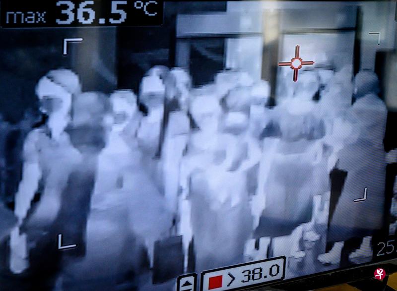作者说,新冠疫情与沙斯(SARS)疫情在所处环境、影响范围以及应对措施方面存在诸多不同,但对金融市场的冲击则存在相似之处。(法新社) 作者说,新冠疫情与沙斯(SARS)疫情在所处环境、影响范围以及应对措施方面存在诸多不同,但对金融市场的冲击则存在相似之处。(法新社)