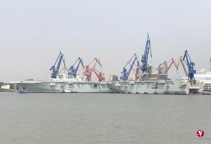 解放军将从今起在渤海湾举行长达两个半月的军演,包括两栖登陆等实战化演练科目。解放军近年不断加强两栖作战能力,图为4月22日下水的“准航母”075型两栖攻击舰。(微博“北方机械制造生产联合体”) 解放军将从今起在渤海湾举行长达两个半月的军演,包括两栖登陆等实战化演练科目。解放军近年不断加强两栖作战能力,图为4月22日下水的“准航母”075型两栖攻击舰。(微博“北方机械制造生产联合体”)